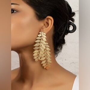 Leaf Design Earrings…Color: Gold…New